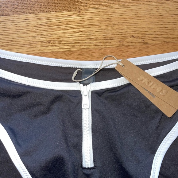 SKIMS 4X sporty zipper skim dipped Tanga bikini/tankini bottom Color: Onyx - Picture 2 of 3